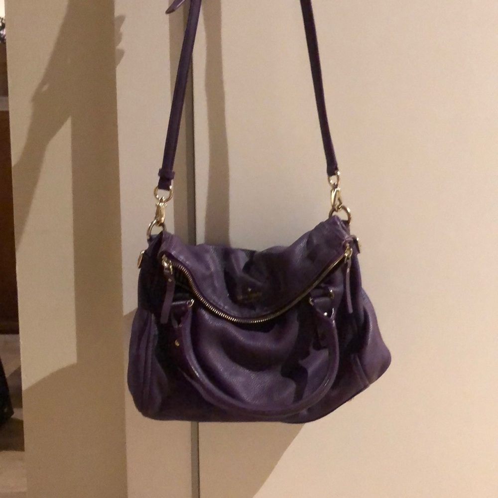 Purple Kate Spade cross body bag